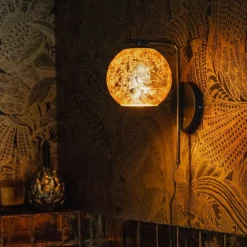 QAZQA Design-Wandleuchte schwarz mit goldenem Glas - Bert