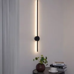 QAZQA Moderne Wandleuchte schwarz 100cm inkl. LED - Clockwise