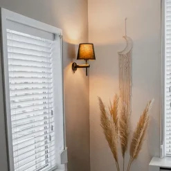 QAZQA Moderne Wandleuchte Schwarz inkl. Schirm mit goldener Innenseite - Pluk